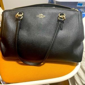 Black coach bag 3 compartments. Zip and snap enclosures